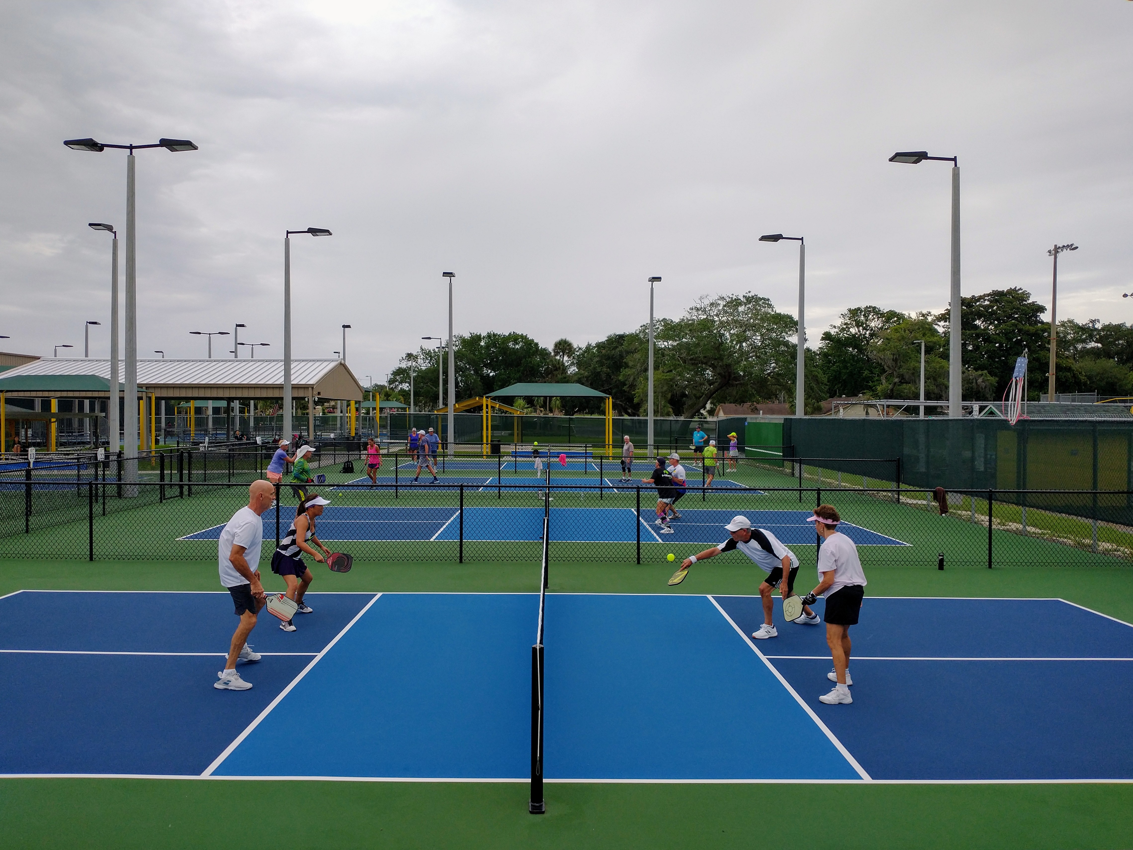 Multiple pickleball matches during an organized round robin